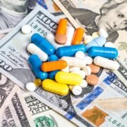 heap-of-pills-on-the-dollars-background_547271-1034